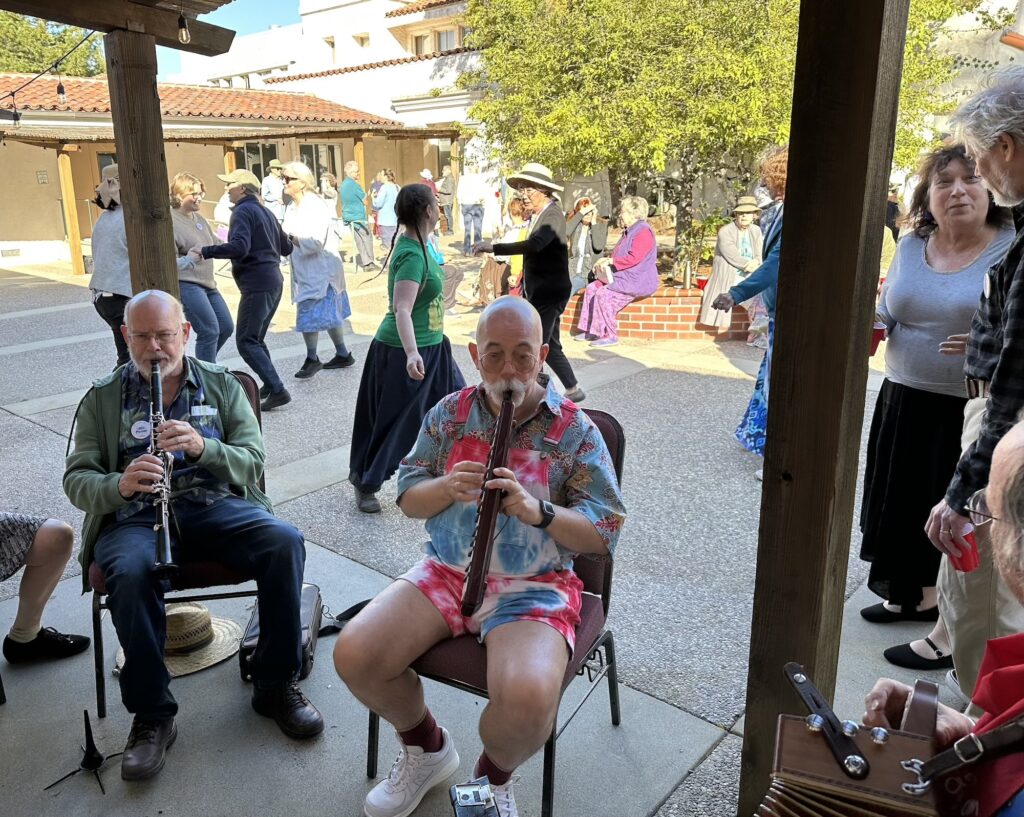 People jamming and dancing in the courtyard at Hey Days 2025.